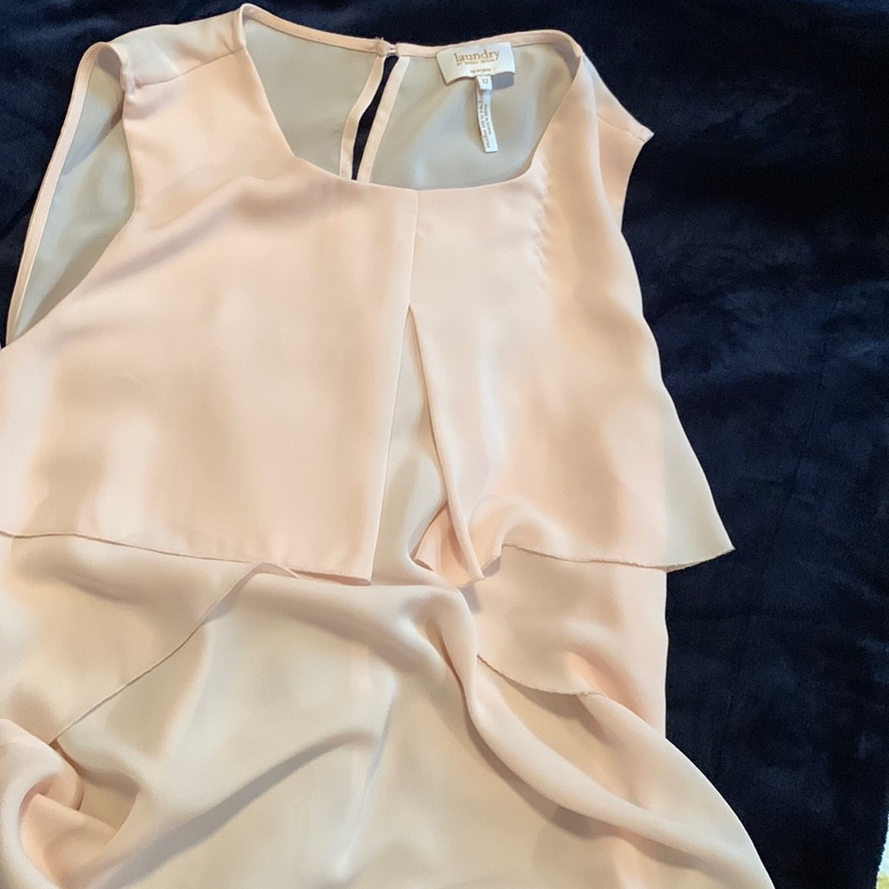 Soft peach sleeveless blouse. Size 12